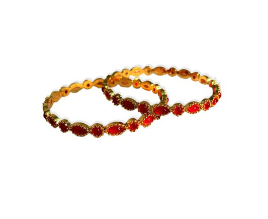 Gold Plated Kemp Bangles With Round Oval Red Stones