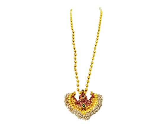 Gold plated half moon dollar with red stone and white pearl
