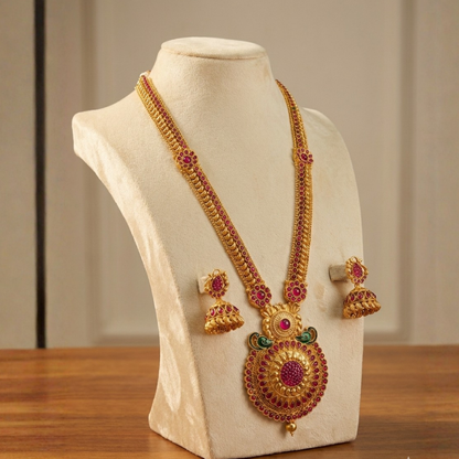Grand Haaram With Red and Green Small Peacock Design