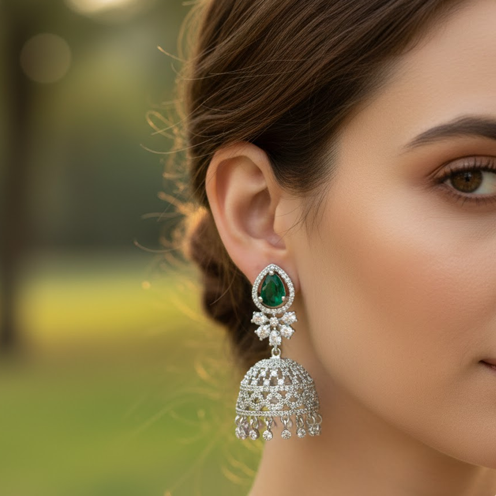 Silver Jhumkas With White And Green Stone