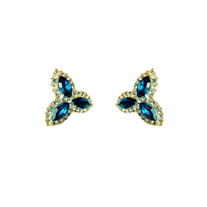 Gold plated triple leaf stud with blue and white stone
