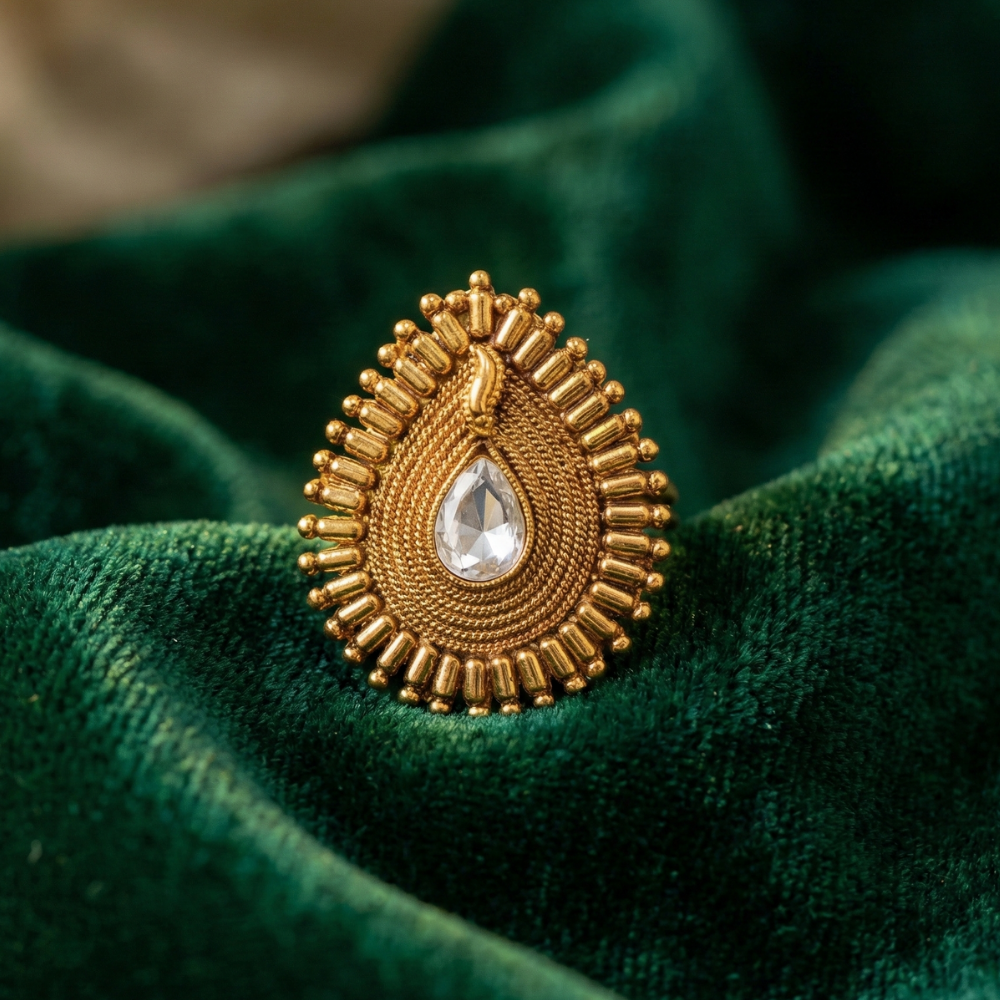 Thilagam Pattern Finger Ring with a White Stone
