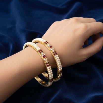 Gold Plated Pearl Bangles With Red Stones