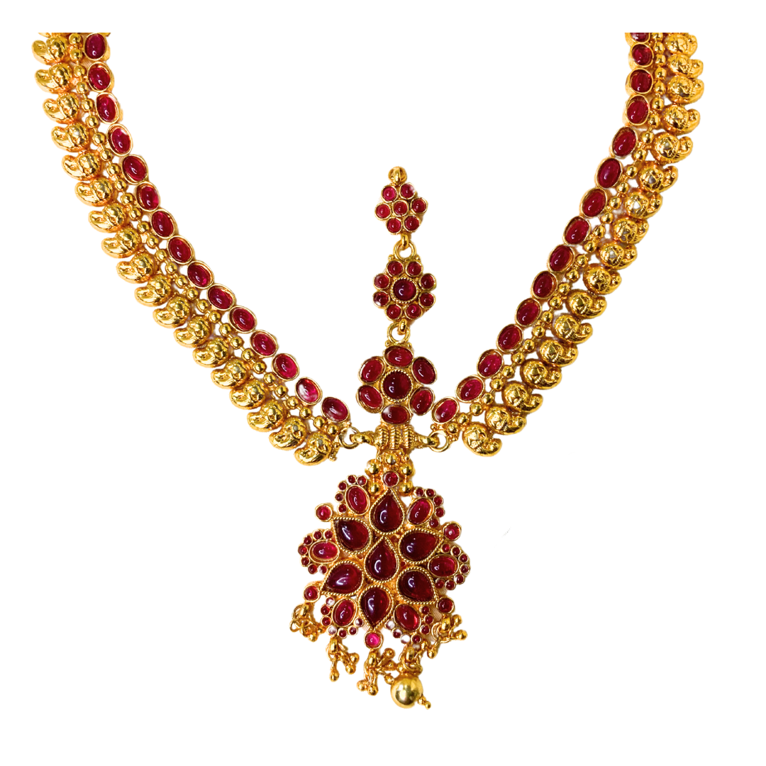 Gold plated matha patti leaf design covered red stones