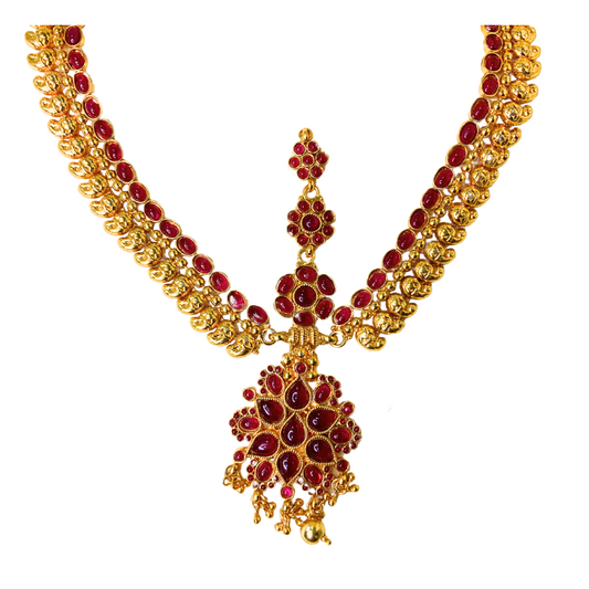 Gold plated matha patti leaf design covered red stones