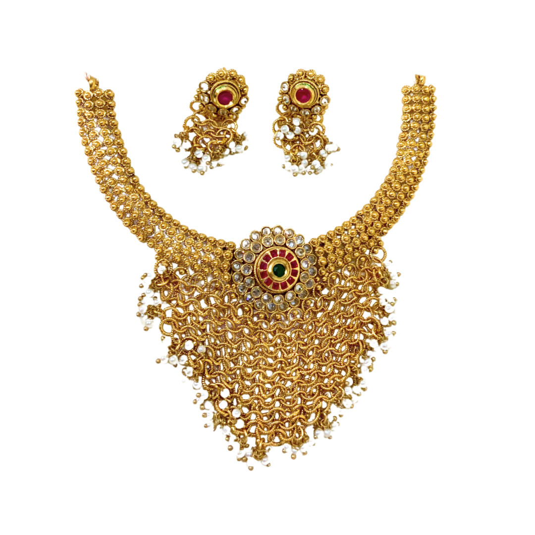 Gold plated torque design necklace with pink stone