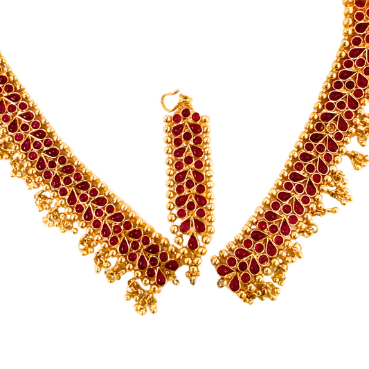 Gold plated matha patti leaf design coverd red stones