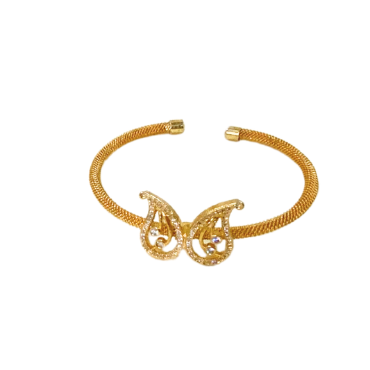 Gold plated bracelet manga design with white stone