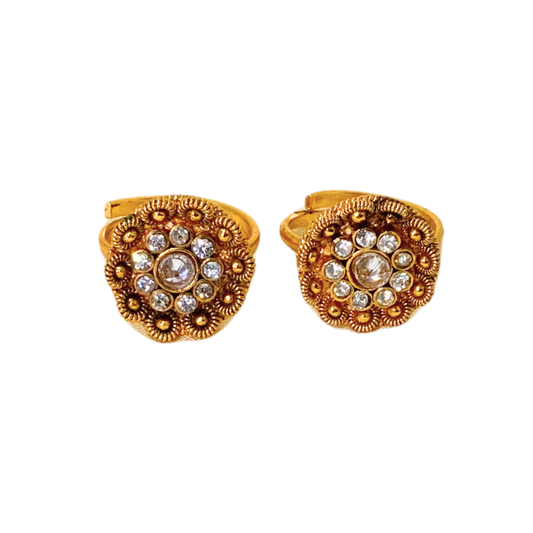 Gold plated ring with white stone flower design