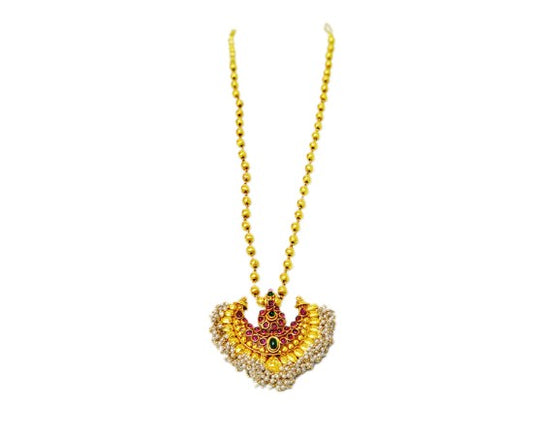 Gold plated half moon dollar with red stone and white pearl